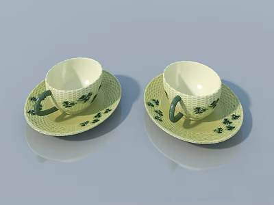 Two Piece Teacup and Saucer Set With Green Pattern And White Base Design 3d model