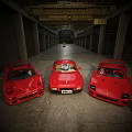Three Red Vintage Sports Cars Parked In Spacious Garage Interior With Classic Design