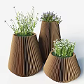 Brown Striped Tapered Vases With Green Plants White Flowers And Purple Blooms