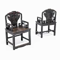 Traditional Chinese Carved Wooden Lounge Chairs with Ornate Backrest and Armrest Design