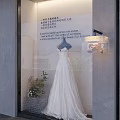 Elegant Bridal Window Display with Soulful Wedding Dress and Fresh Flower Bouquet