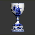 Intricate Sculpted Ceramic Goblet With Blue White Patterns And Orange Lion Design