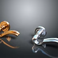 Stylish Gold And Silver Modern Door Handles With Polished Reflective Surfaces