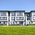 Modern Townhouse Exterior Design With Front Lawn And Large Windows In Neutral Tones