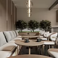 Modern Coffee Shop Interior With Comfortable Sofa Round Tables And Green Plants