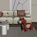 Living Room Scene With Beige Sofa Brown Pillow And Toy Unicorn With Wings