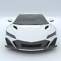 White Sports Car With Streamlined Body Black Rear Spoiler And Red Brake Calipers