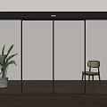 Modern Sliding Glass Doors With Black Frame Interior Green Plant Chair And Wooden Floor