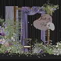 Romantic Floral Installation with Purple Drapery Wooden Arch Green Plants and Love Fairy Sign