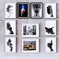Colorful City Landscape Painting With Black And White Art Frames On Wall