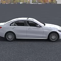 White Mercedes Benz Sedan With Sleek Front Design And Alloy Wheels