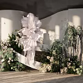 Elegant Banquet Hall Interior Design With Large White Floral Decor And Green Plants