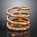 Luxury Gold Snake Design Coiled Bracelet With Textured Surface And Gemstone