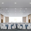 Spacious Modern Banquet Hall with White Blue Chair Covers Ceiling Lights and R Background Wall