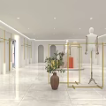 Elegant Modern Clothing Store Interior With White Walls Gold Accents And Marble Flooring