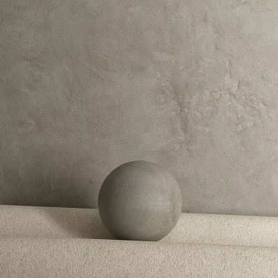 Gray Textured Sphere Component Placed On Light Colored Surface Against Textured Gray Wall 3d model