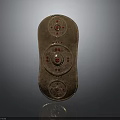 Golden Medieval Shield With Red Gemstones And Intricate Decorative Patterns