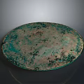 Ancient Circular Bronze Sculpture With Green Patina And Aged Surface Details