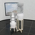 Two Modern Home Water Dispensers With Transparent Bottles White Bases And Stands Indoor