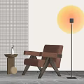 Modern Single Sofa With Brown Upholstery Wooden Frame Small Side Table Vase And Floor Lamp