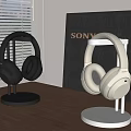 Sony Black and White Headphones Displayed on Stands in Modern Desktop Setup