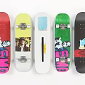 Colorful Skateboards With Various Graphic Art Designs And Different Color Patterns On Deck