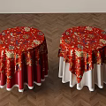Round Tables With Red Floral Tablecloths And White Edges On Herringbone Floor