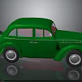 Vintage Green Classic Car With Rounded Body Spare Tire And Retro Design