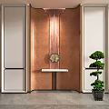 Elegant Copper Toned Background Wall with Decorative Ornament and Small Console Table