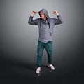 A Man In Gray Hoodie Green Pants White Sneakers Flexing Arms Showing Muscles