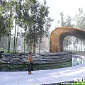 Natural Landscape Wall Surrounded By Bamboo With Wooden Arched Structure Water Pool And Stone Path