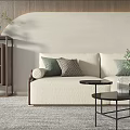 Modern Beige Sofa and Black Coffee Table Set with Green Cushions Plants and Wooden Decor