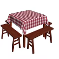 Wooden Dining Table Set With Red And White Checkered Tablecloth And Benches