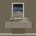 Light Colored Entryway Sideboard Cabinet With Vase Painting Photo Frames And Book