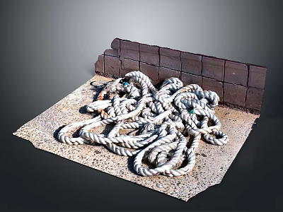 White And Gray Tangled Rope Piled On Textured Mat Beside Brick Wall 3d model