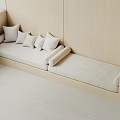 Wooden Bench Seating Area With White Pillows Light Rug And Window Blinds