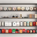 Tea Set Collection Display on Multi Layered Shelf with Tea Cakes and Colorful Canisters