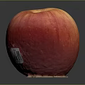 Fresh Ripe Red Apple With Sticker On Dark Reflective Surface