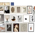 Diverse Framed Artworks Collection on White Wall with Various Styles and Designs