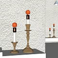 Decorative Ornament Set With Lit Candles On Wooden Candlesticks Of Different Heights And Textured Wall
