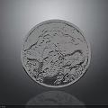 Shiny Silver Round Object With Intricate Carved Patterns And Detailed Design
