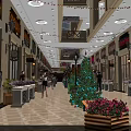 Shopping Mall Hall Featuring Decorative String Lights Store Signs Christmas Tree Flower Decorations And Pedestrians