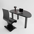 Modern Minimalist Black Oval Desk With Laptop And Lamp Beside Stylish Wavy Chair