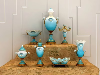 Elegant Blue Ceramic Vessels With Gold Accents On Decorative Display Stand 3d model
