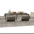 Wooden Outdoor Dining Table With Beige Cushioned Chairs And Fruits On A Rug
