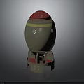 Artillery Weapon With Green Body Red Top Yellow Stripes Circular Holes and Red Base