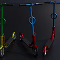 Three Stylish Metal Scooters Featuring Green Blue Red Colors Single Wheel Design and Black Handlebars