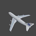Dark Colored Airplane Flying With White Wings And Tail Logo In Sky