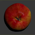 Juicy Ripe Red and Yellow Apple on Dark Background with Shiny Surface