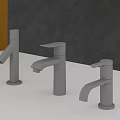 Three Silver Faucets on White Countertop with Gray and Yellow Walls